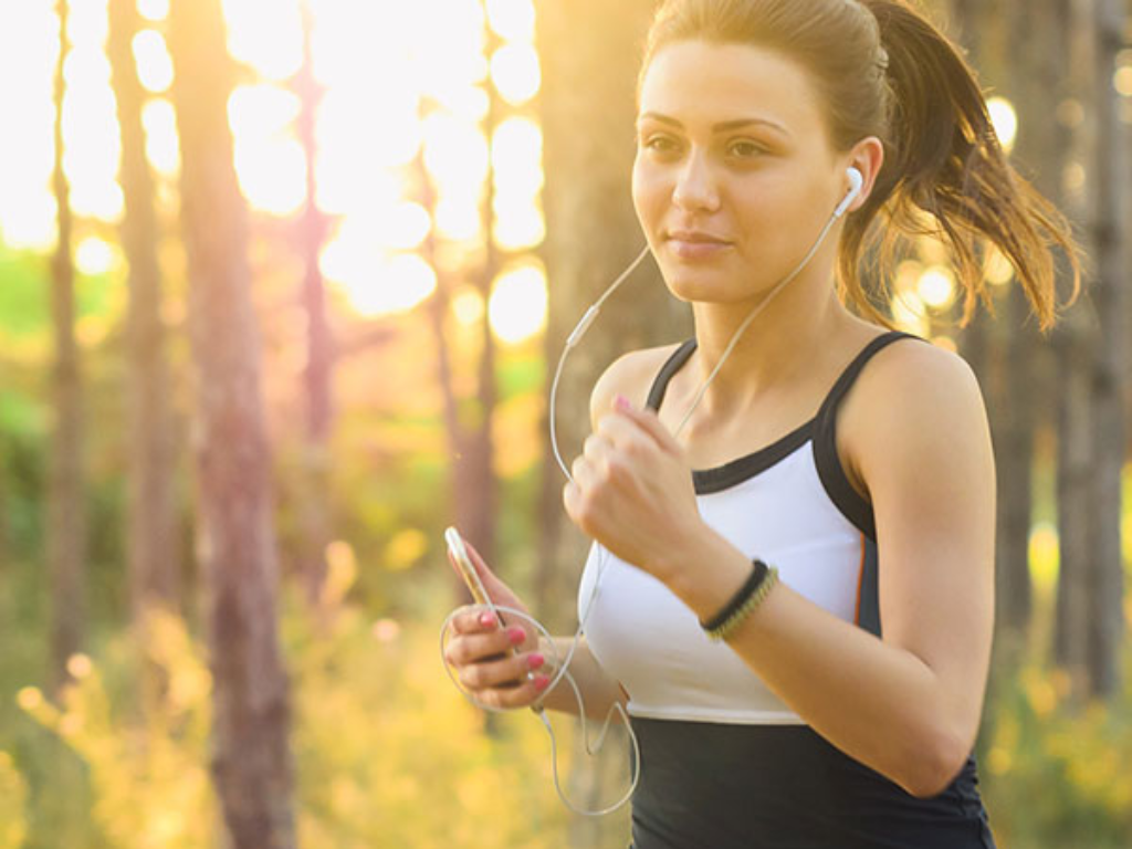Woman jogging in the woods