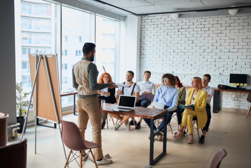 a speaker presenting to a group of people